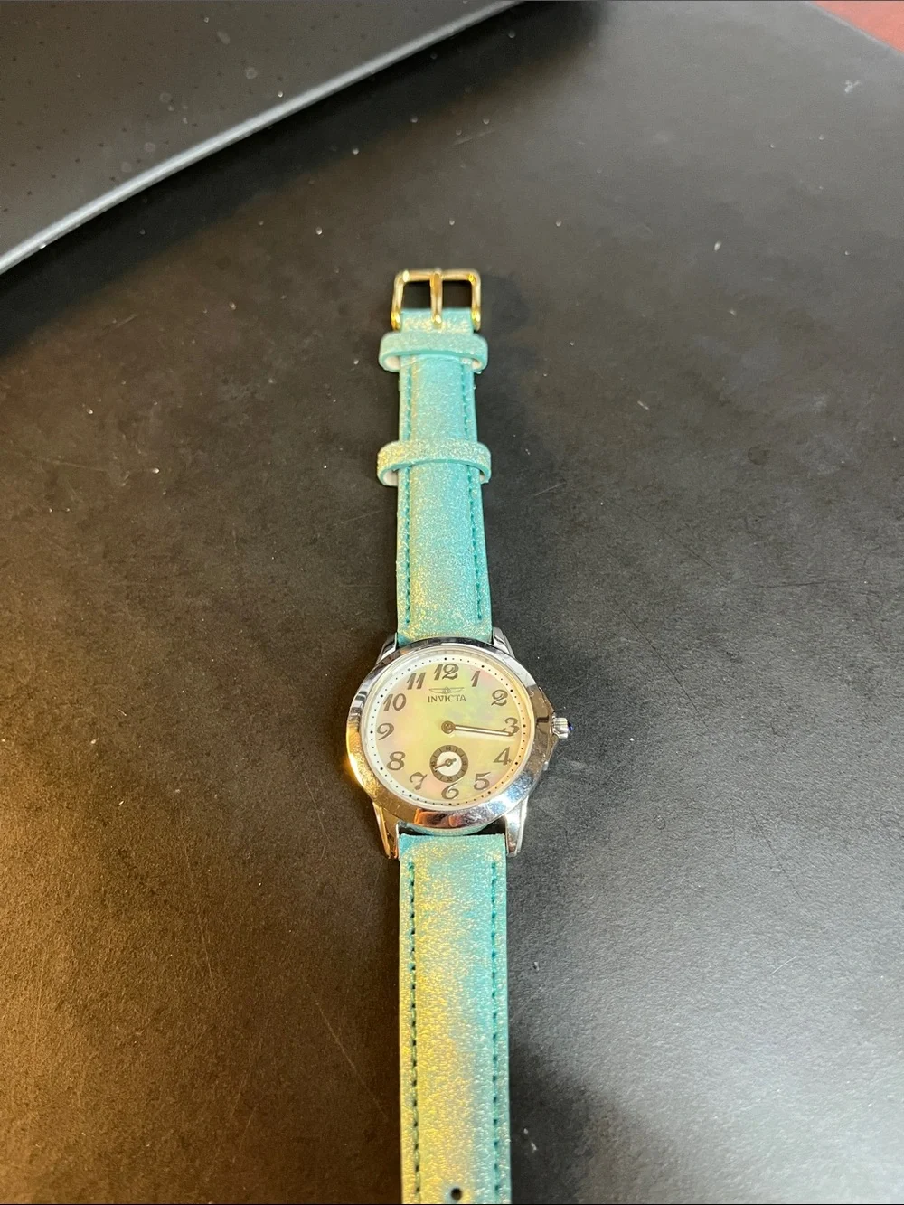 Invicta Model 5702 Swiss Movement Mother of Pearl Dial Watch